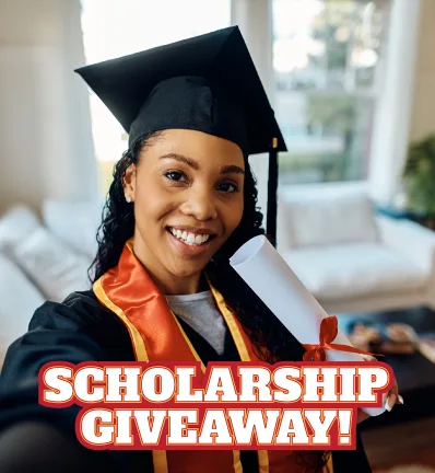 Smiling graduate in cap and gown holds a diploma indoors. Text overlay: "Scholarship Giveaway!" Bright and celebratory mood.